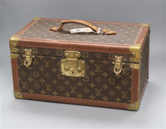 A Louis Vuitton vanity case, serial number 949439 (mirror damaged)